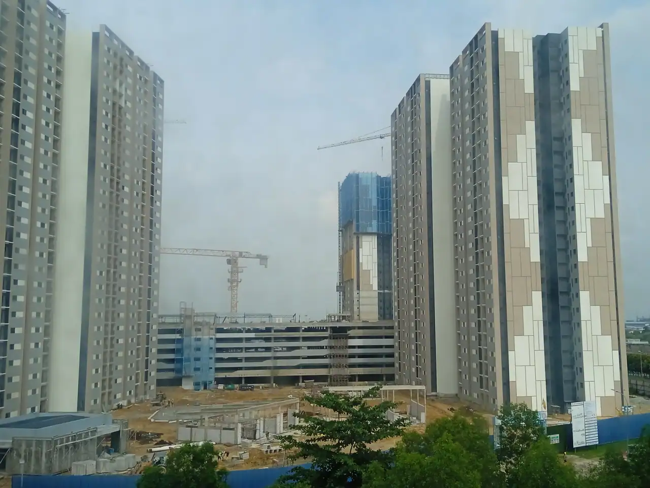 Idaman Kwasa Damansara towers seen from the south with the podium at their base